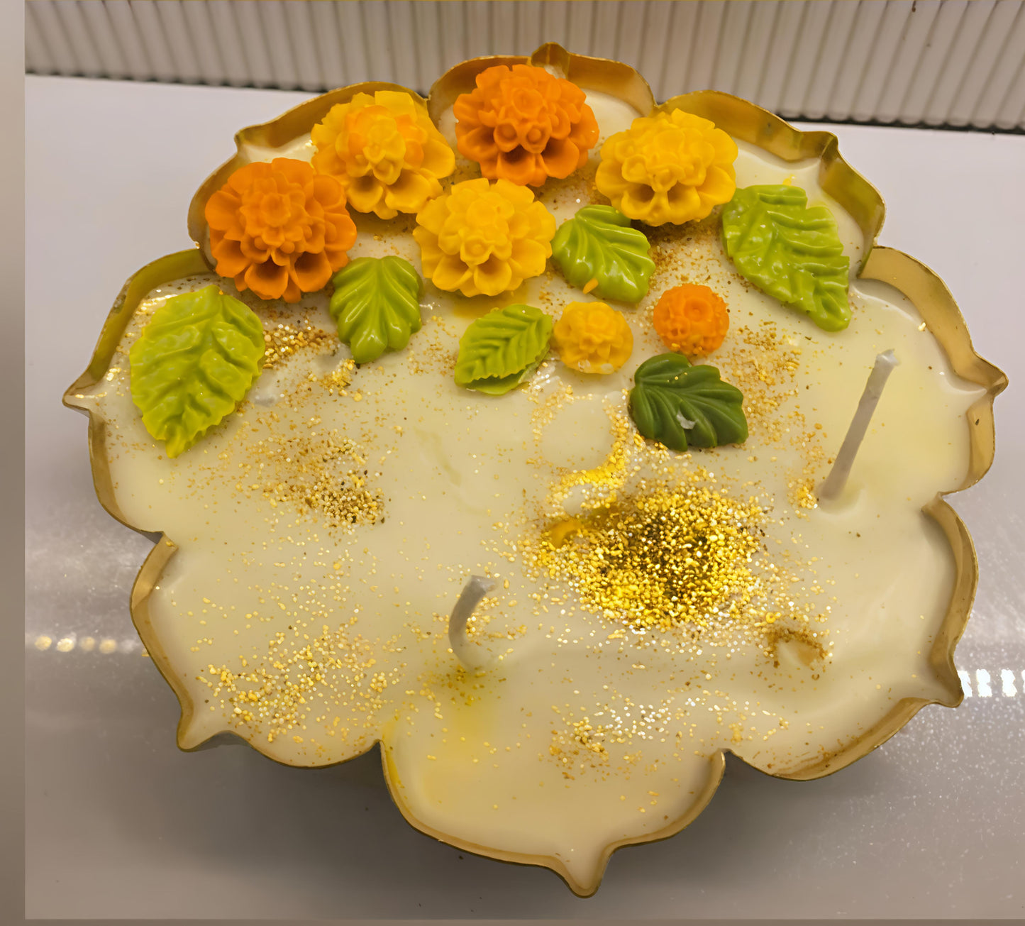 Urli Candle with Flowers – A Festive Glow of Tradition & Fragrance 🌺