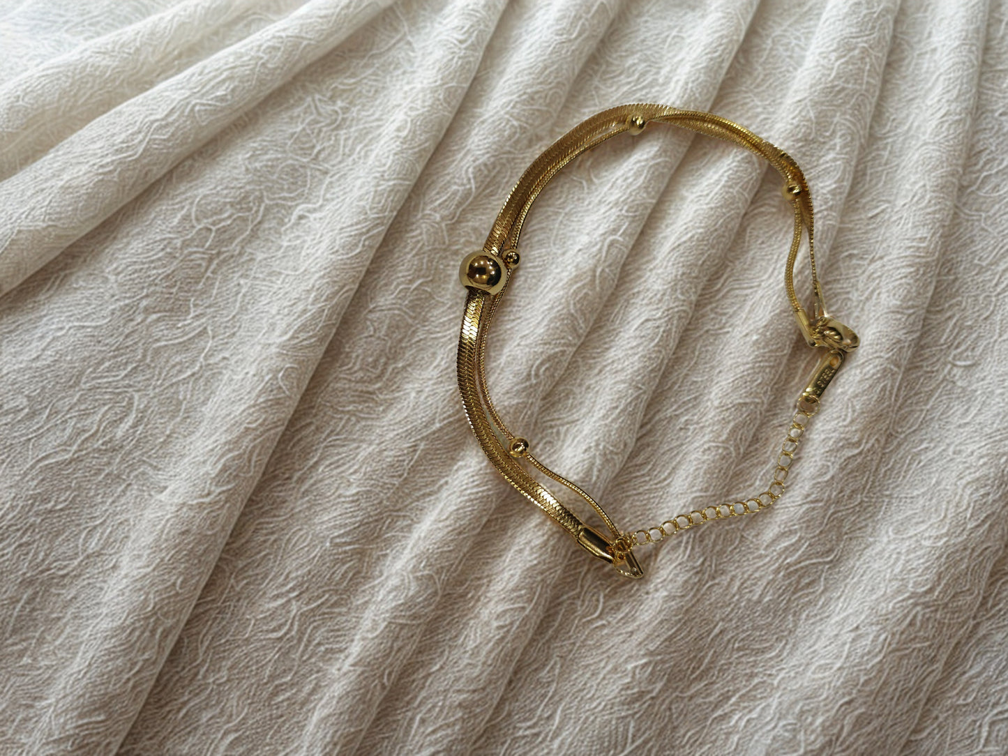 Elegant Dual-Strand Gold Bracelet